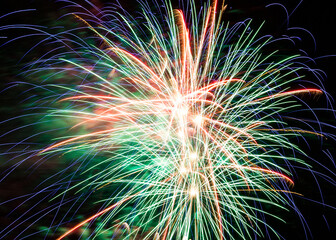 Fototapeta premium Beautiful fireworks in night sky for New Year
