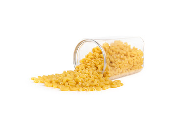 Pasta (macaroni) overflows from the plastic jar,isolated on white background with clipping path.
