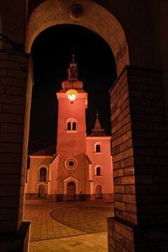 Church At Town Ruzomberok (Slovakia) Illuminated In Red Due Event Red Wednesday 2020