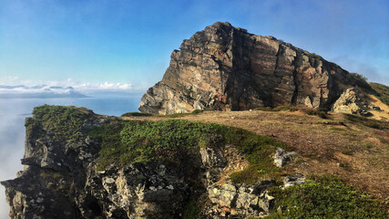 Fototapeta premium Cliff and disturbing abyss in Harstad (Norway).