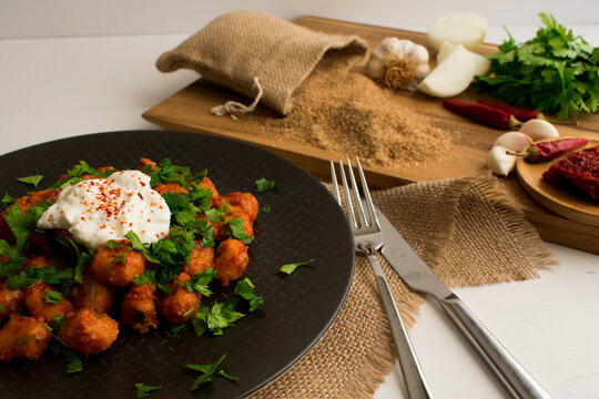 Traditional Turkish Food, Fellah Kofte. Bulgur meatballs with tomato paste and garlic.