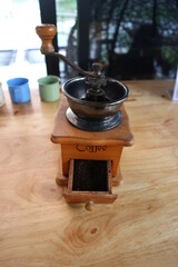 Hand operated coffee bean grinder