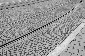 Tram rails on paving stones close-up