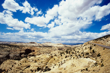 Fototapeta na wymiar Cloudscape above rocky landscape