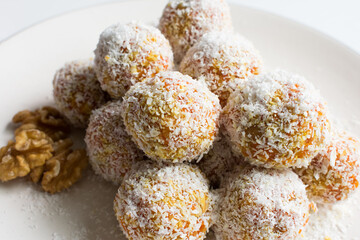 Close view of carrot coconut dessert balls.