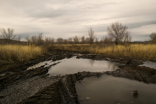 Beautiful autumn landscape in the steppe. Country dirt road. Grunge nature. Ust-Kamenogorsk outskirts, kazakhstan