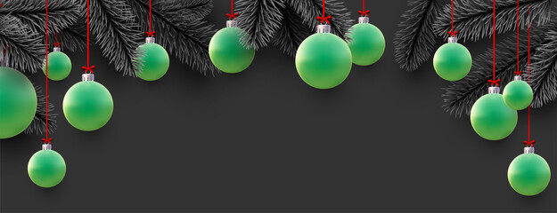 Xmas green baubles and spruce branches.