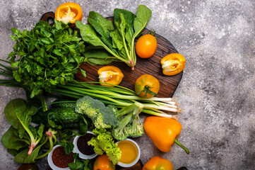 Ingredients for cooking healthy food with chopping board on the table