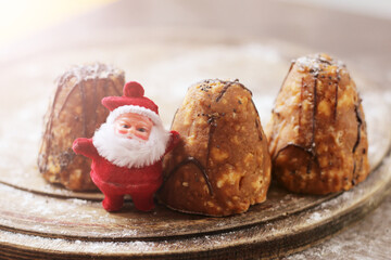 Santa Claus toy and chocolate cake