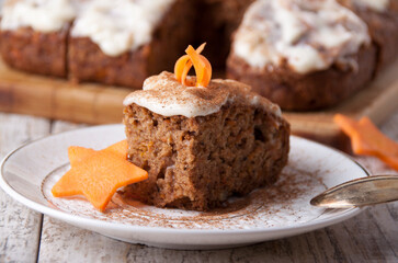 Carrot cake with creamy icing and cinnamon
