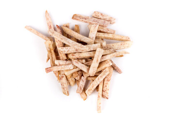 Pile of dehydrated taro snack sticks isolated over white top down view
