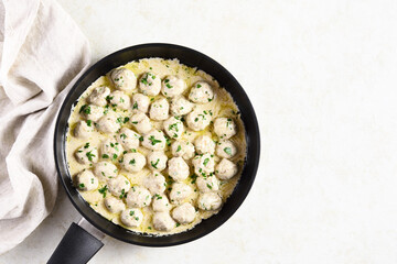 Swedish meatballs with white creamy sauce