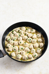 Swedish meatballs with white creamy sauce