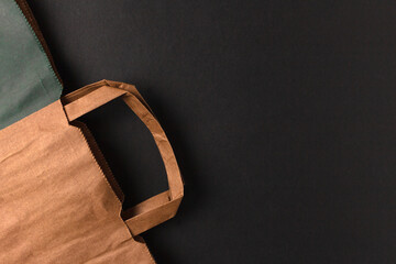 Paper shopping bag on a dark background