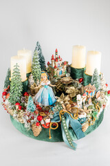 Advent wreath with candles, table handmade arrangement mini decoration for new year, artificial Christmas tree interior decoration