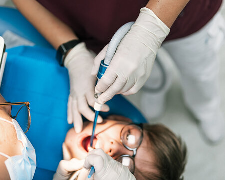 Young Boy During Checkup in Dentist