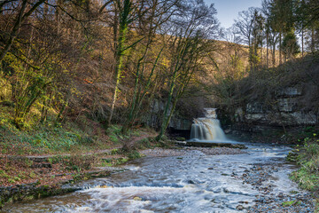 A winter blended HDR image of West Burton Falls, also know as Cauldron Falls, in the village of West Burton, Bishopdale, Yorkshire, England.