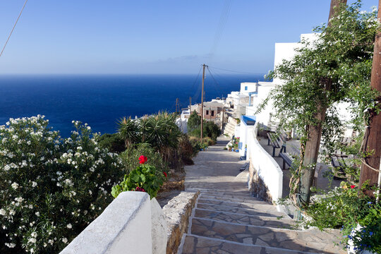 Beautiful panoramic view of Anafi village,  narrow cobbled staircase from the main road of Chora - Cyclades islands, Greece

