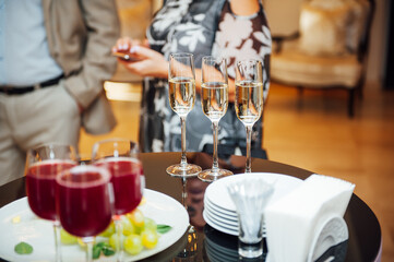 Glasses of champagne at the Banquet, white sparkling wine in wine glasses, festive mood