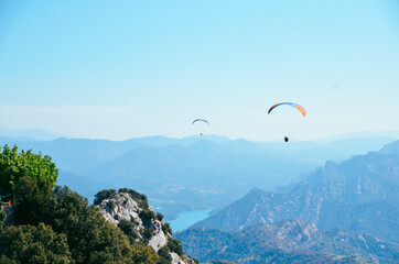 Parachuting flying over mountains