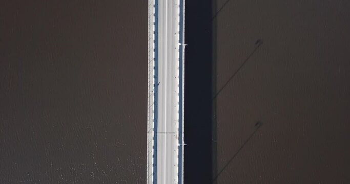 Aerial view of bridge stretching across Lake Ladoga. High quality 4k footage