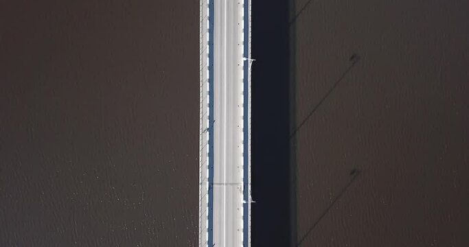 Aerial view of bridge stretching across Lake Ladoga. High quality 4k footage