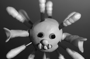 The figure of the virus on the table.
