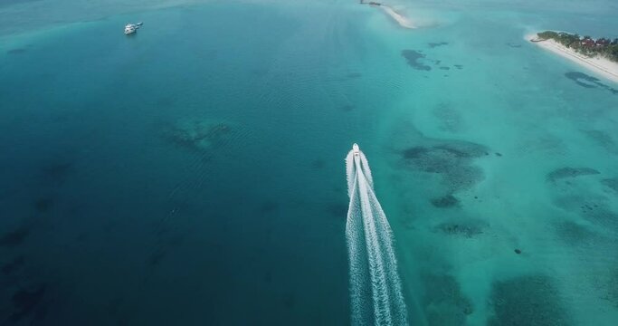 Aerial view of a boat near Huraa, North Male Atoll, Maldives, Indian Ocean . High quality 4k footage