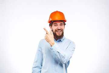 emotional men orange helmet engineer construction industry lifestyle cropped view