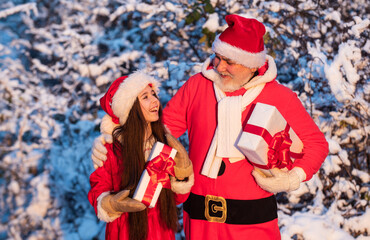 Gifts from Santa. Frosty christmas morning. Santa and granddaughter. Time for miracles. Generous...