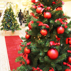 Christmas tree with new year decorations. New Year celebration. Selective soft focus. Background for postcards