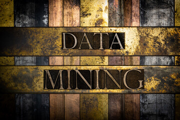 Data Mining text message on textured grunge copper and vintage gold background