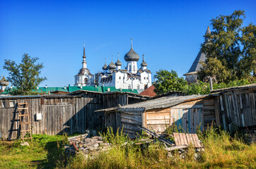 The courtyard of a residential building with wooden sheds on the Solovetsky Islands
