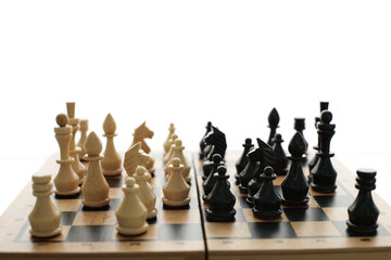 Wood chess pieces on a board