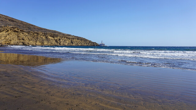 Monta&ntilde;a Pelada beach in Tenerife, Canary Islands, Spain. Seashore on a sunny day.            
