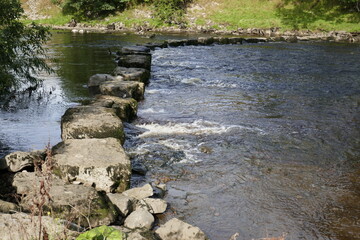 Stepping stones across river yorkshire dales