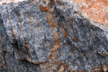 Stones texture and background. Rock texture.  Orange gray texture.