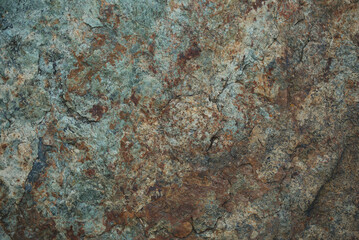 Obraz na płótnie Canvas Stones texture and background. Rock texture. Brown green texture.