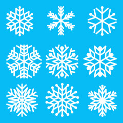 Set of vector white snowflakes isolated on blue background. Template for Christmas decoration. Vector illustration. Eps 10