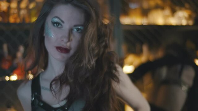 Sexy fashion young women in erotic lingerie dancing in nightclub