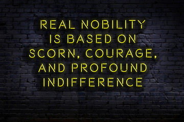 Smart and motivational quotation. Neon sign on brick wall