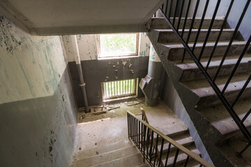 Staircase in abandoned house of soviet ghost town Chernobyl-2