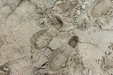 Imprint of the shoe on mud with copy space
