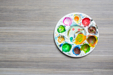 Acrylic paint on an artist's plastic paint palette © jessicagirvan