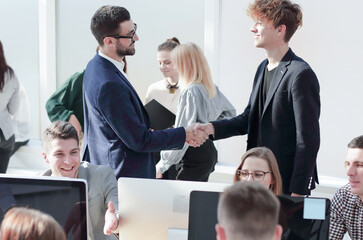 employees discussing work issues in the office