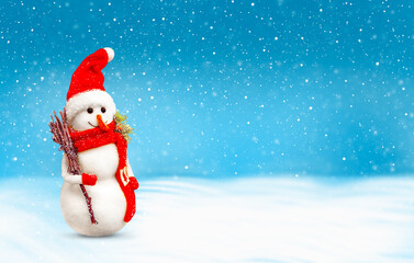 Happy snowman on a blue snowy background.