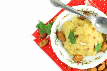 traditional indian gujrati sweet almond shira or almond halwa as offering to gods with copy space