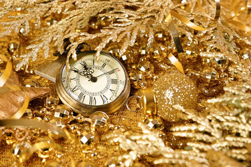 New Year's clock. Decorated with gold tinsel and Christmas decorations. Congratulatory background - 395847698