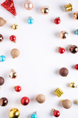 Creative layout made of Christmas bauble decoration. Flat lay. Holiday background.