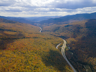 Franconia Notch with fall foliage aerial view including Profile Lake and Echo Lake in Franconia Notch State Park in White Mountain National Forest, near Lincoln, New Hampshire NH, USA. 